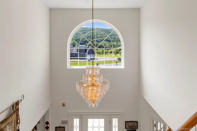 a front view of a house with large windows