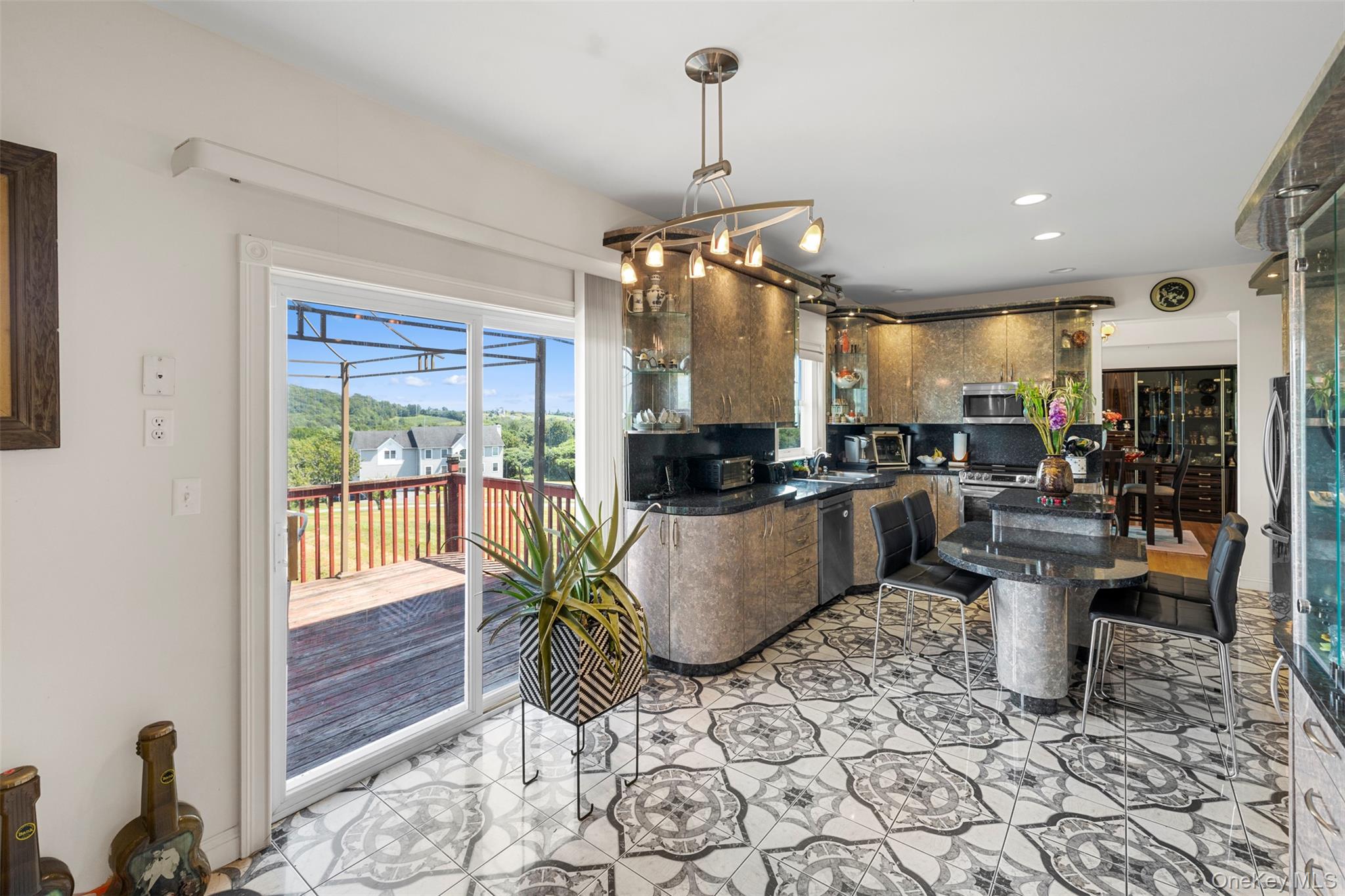 14 Burma Road Marlboro, NY 12542 - Photo 10 of 30 a kitchen with a chandelier dining table and chairs