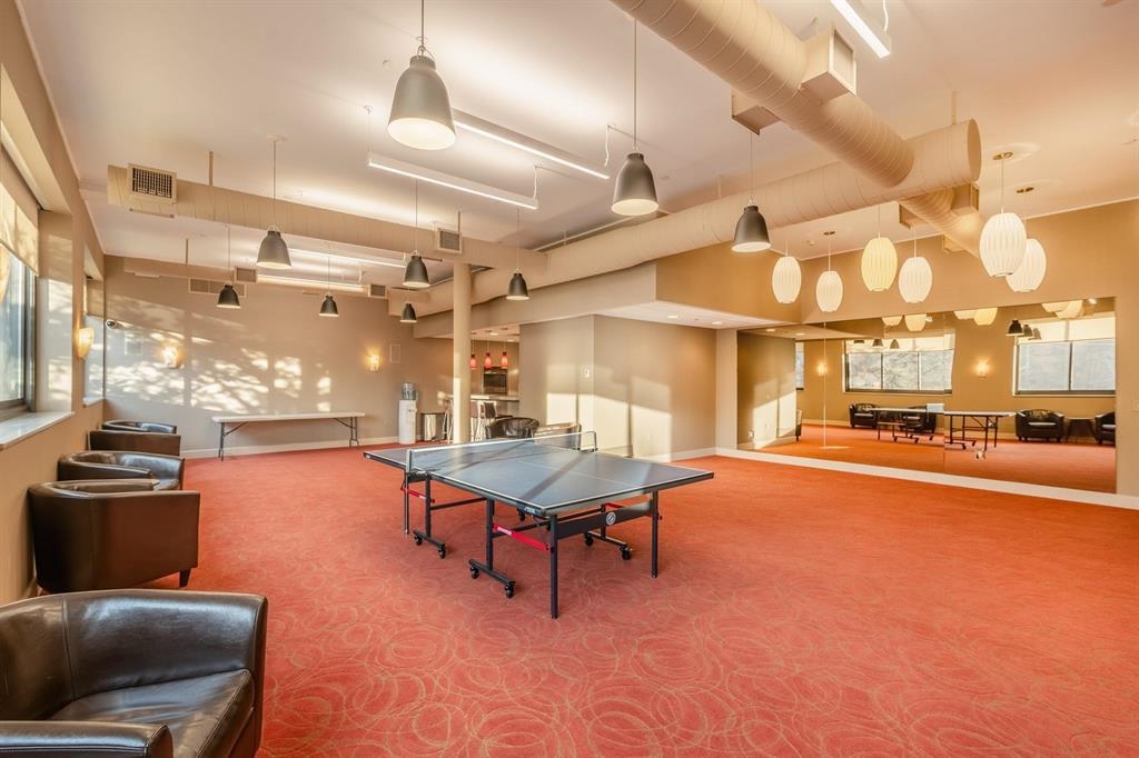 250 Gorge Road Cliffside Park, NJ 07010 - Photo 38 of 46 a room with lots of furniture and view of a gym