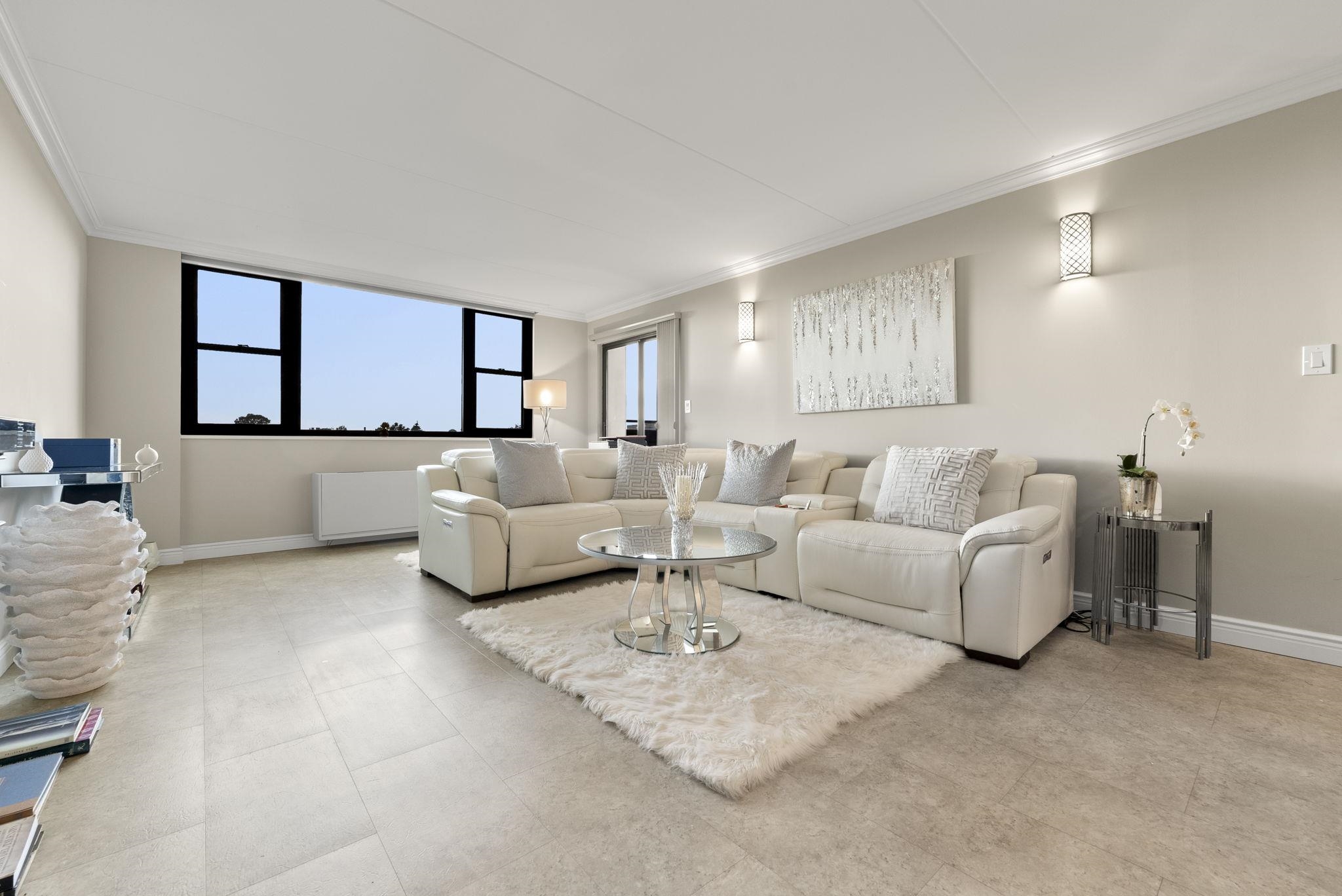250 Gorge Road Cliffside Park, NJ 07010 - Photo 10 of 46 a living room with furniture and a large window