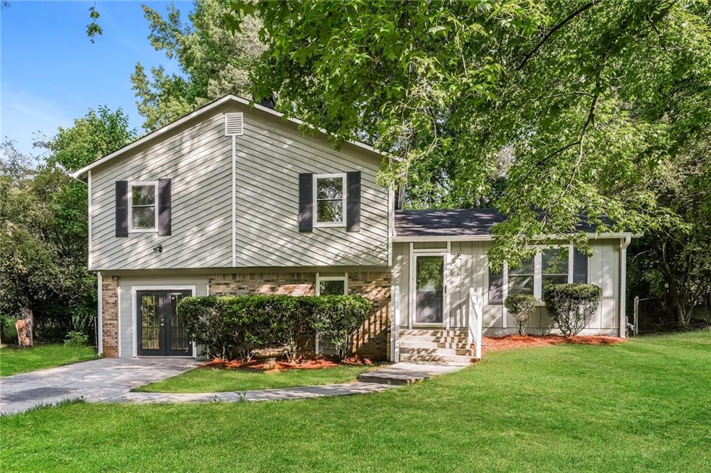 4324 Juneberry Court Decatur, GA 30034 - Photo 1 of 1 a front view of house with yard and outdoor seating