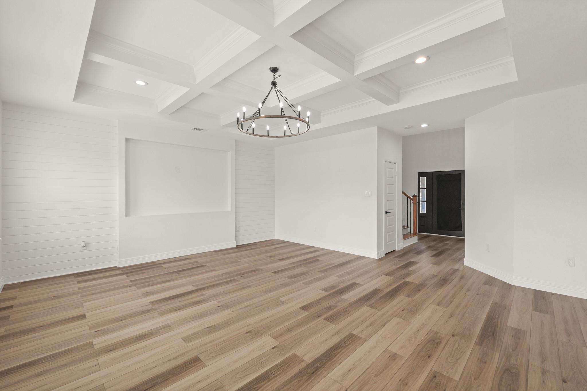 24585 Tipperary Street Hempstead, TX 77445 - Photo 18 of 50 Living room with view of front door and partial staircase.