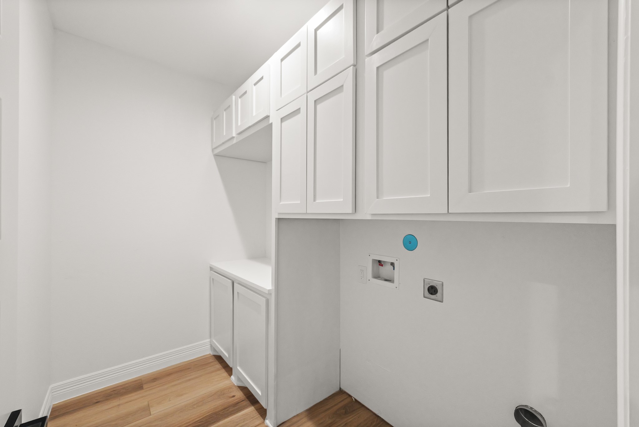 24585 Tipperary Street Hempstead, TX 77445 - Photo 35 of 50 Laundry room upstairs in hall.