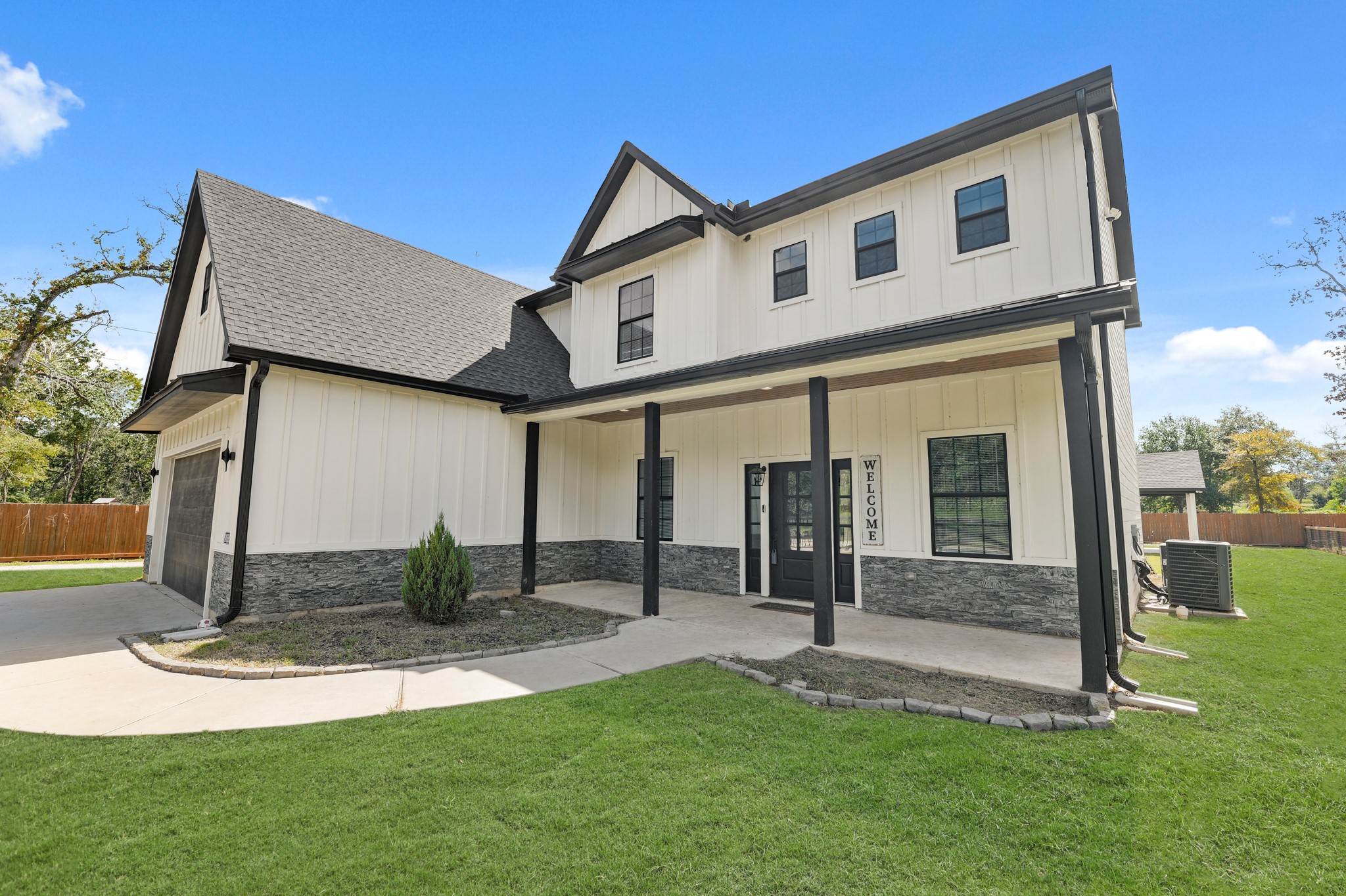 24585 Tipperary Street Hempstead, TX 77445 - Photo 5 of 50 Double car garage large walkway and porch.