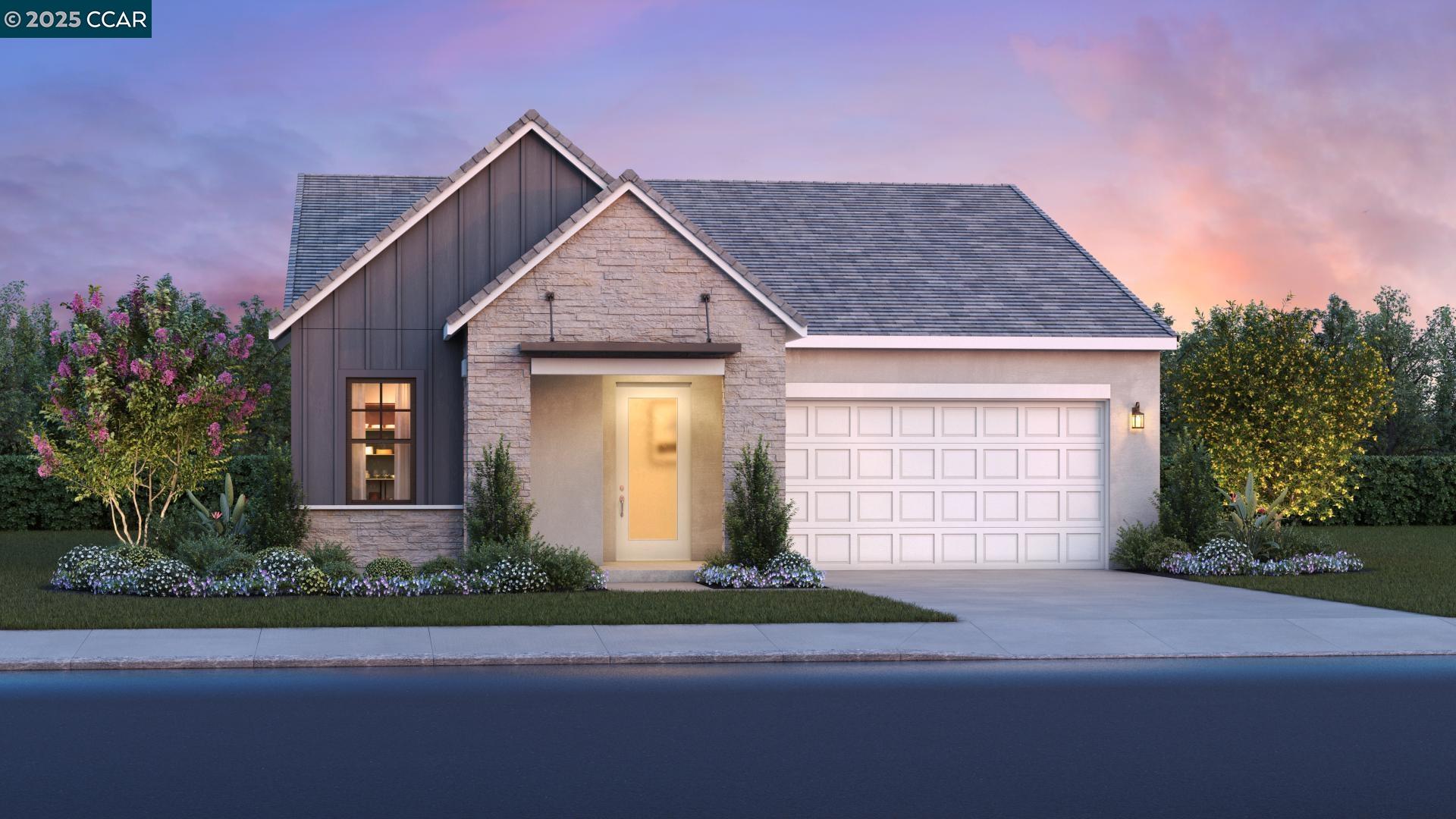 1893 Cascade Lane Tracy, CA 95377 - Photo 11 of 38 a front view of a house with a yard and garage