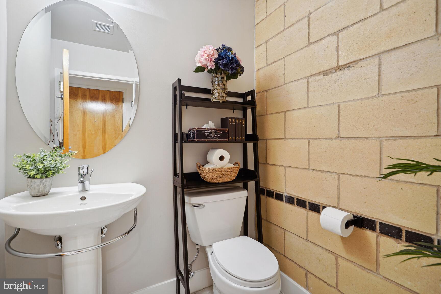 1529 14th Street Northwest, Unit 310 Washington, DC 20005 - Photo 10 of 26 Powder room, perfect for guests.