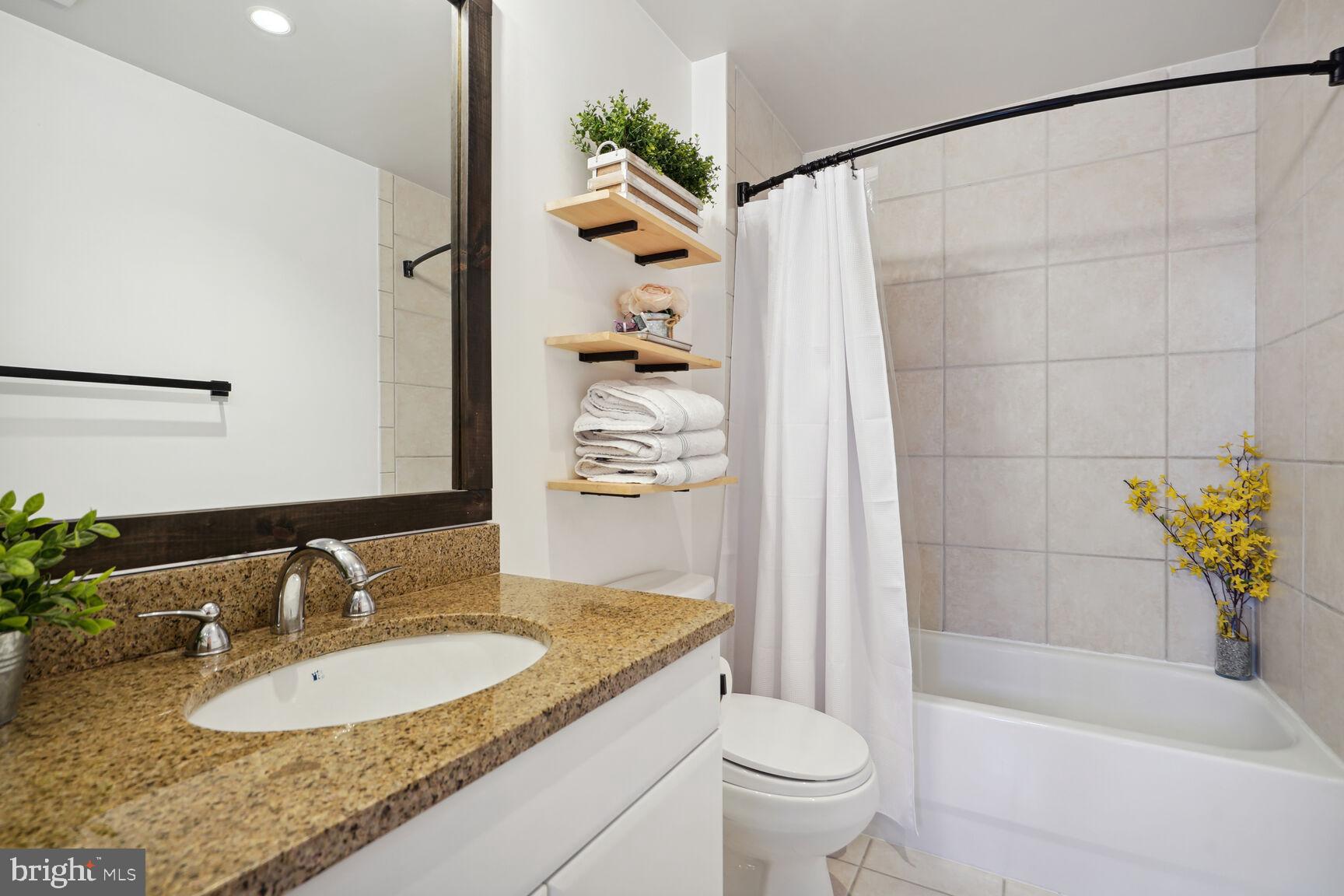 1529 14th Street Northwest, Unit 310 Washington, DC 20005 - Photo 15 of 26 Serene ensuite bathroom.