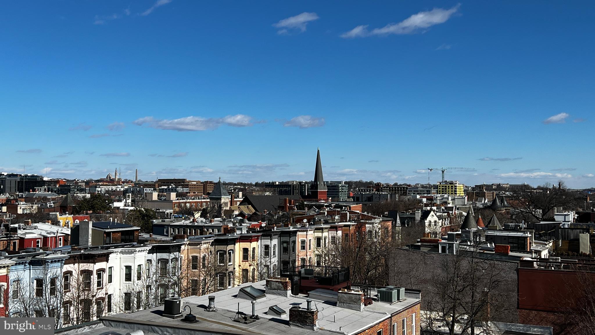 1529 14th Street Northwest, Unit 310 Washington, DC 20005 - Photo 21 of 26 View of DC rooftops from the rooftop deck.