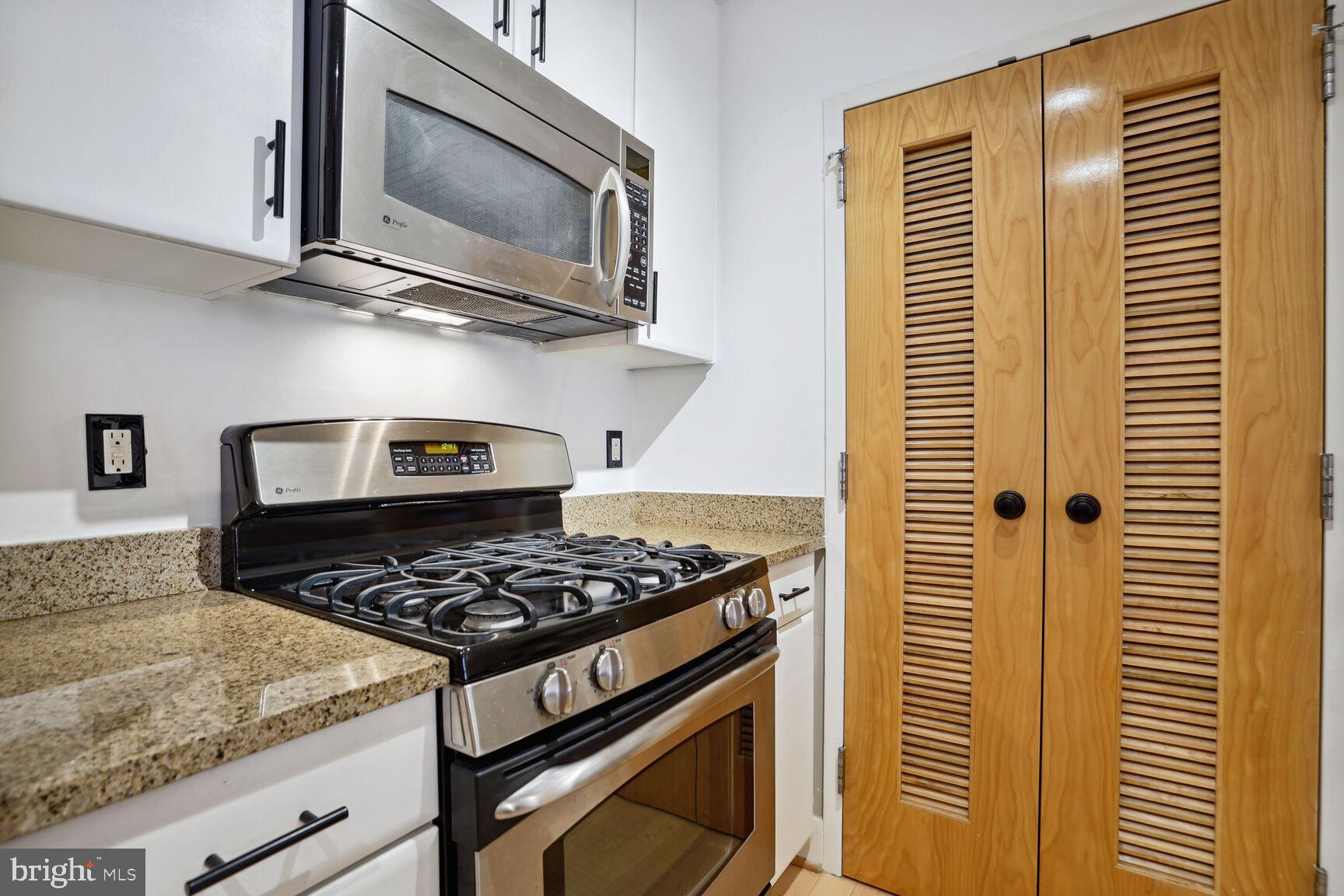 1529 14th Street Northwest, Unit 310 Washington, DC 20005 - Photo 5 of 26 Laundry room adjacent to the kitchen.