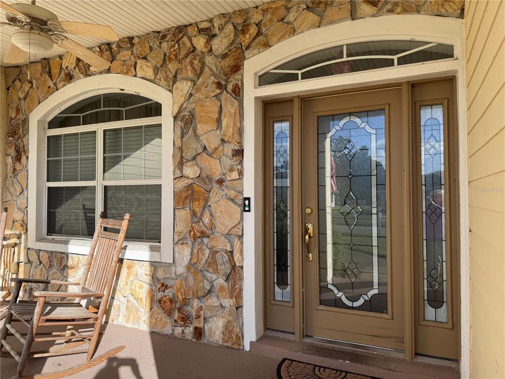119 Hawthorne Road Auburndale, FL 33823 - Photo 2 of 26 a front view of a house with a glass door