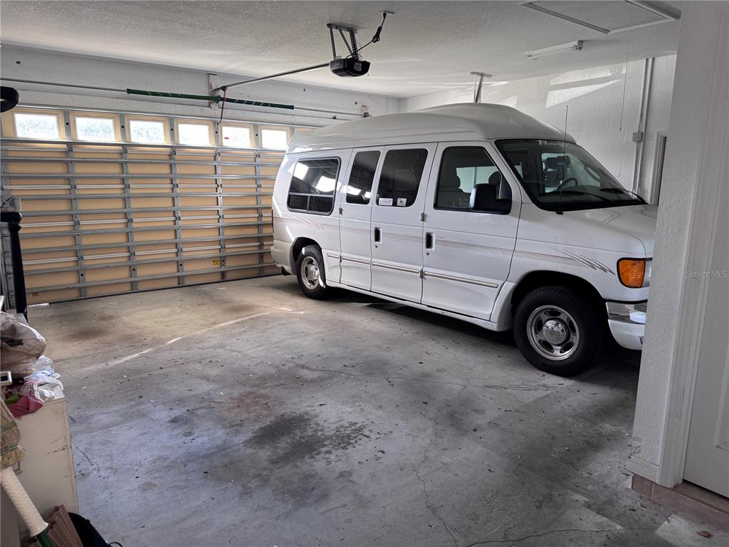 119 Hawthorne Road Auburndale, FL 33823 - Photo 22 of 26 a view of a car in garage