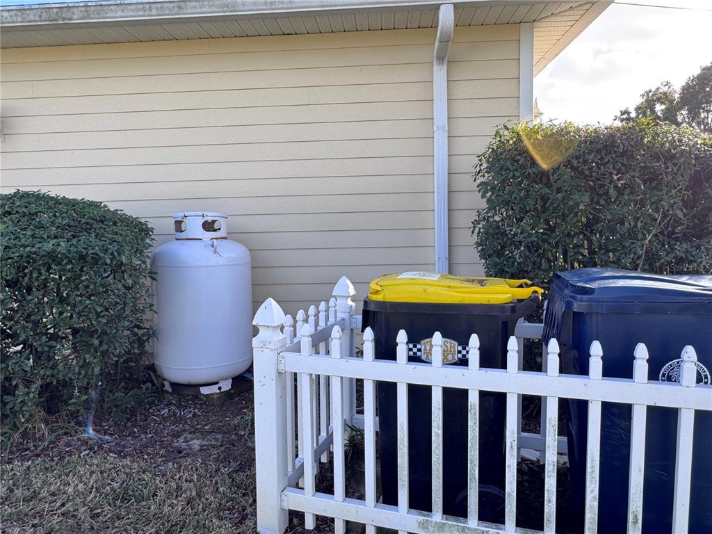 119 Hawthorne Road Auburndale, FL 33823 - Photo 24 of 26 a view of a backyard with a tub and fire pit