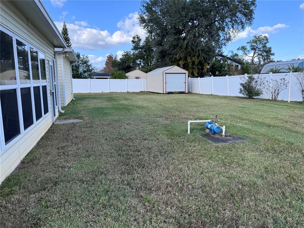 119 Hawthorne Road Auburndale, FL 33823 - Photo 26 of 26 a view of a house with backyard and sitting area