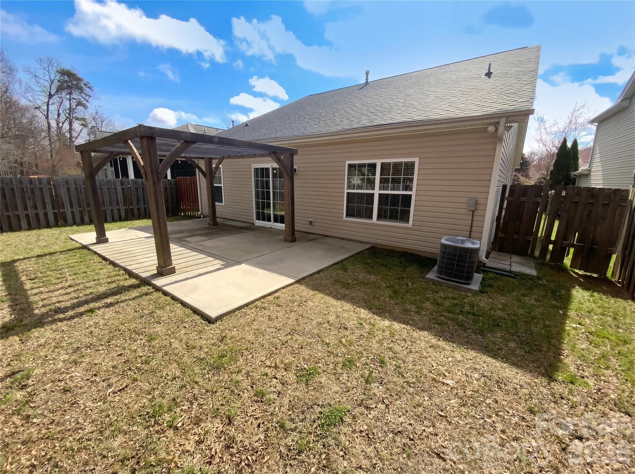 211 Waterlemon Way Monroe, NC 28110 - Photo 8 of 16 a view of a house with backyard