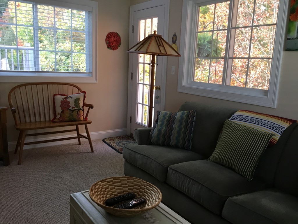 4 D Charles Ridge Road, Unit D Littleton, MA 01460 - Photo 3 of 23 a living room with furniture and a window