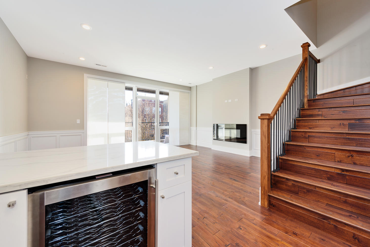 2518 West Division Street, Unit NE Chicago, IL 60622 - Photo 7 of 13 a kitchen with sink cabinets and wooden floor