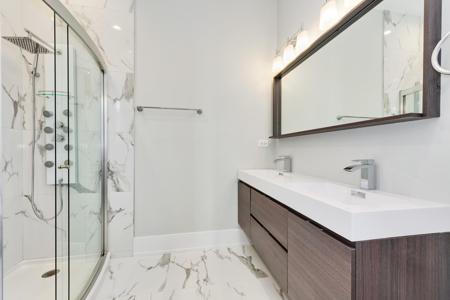 2518 West Division Street, Unit NE Chicago, IL 60622 - Photo 9 of 13 a bathroom with a double vanity sink mirror and