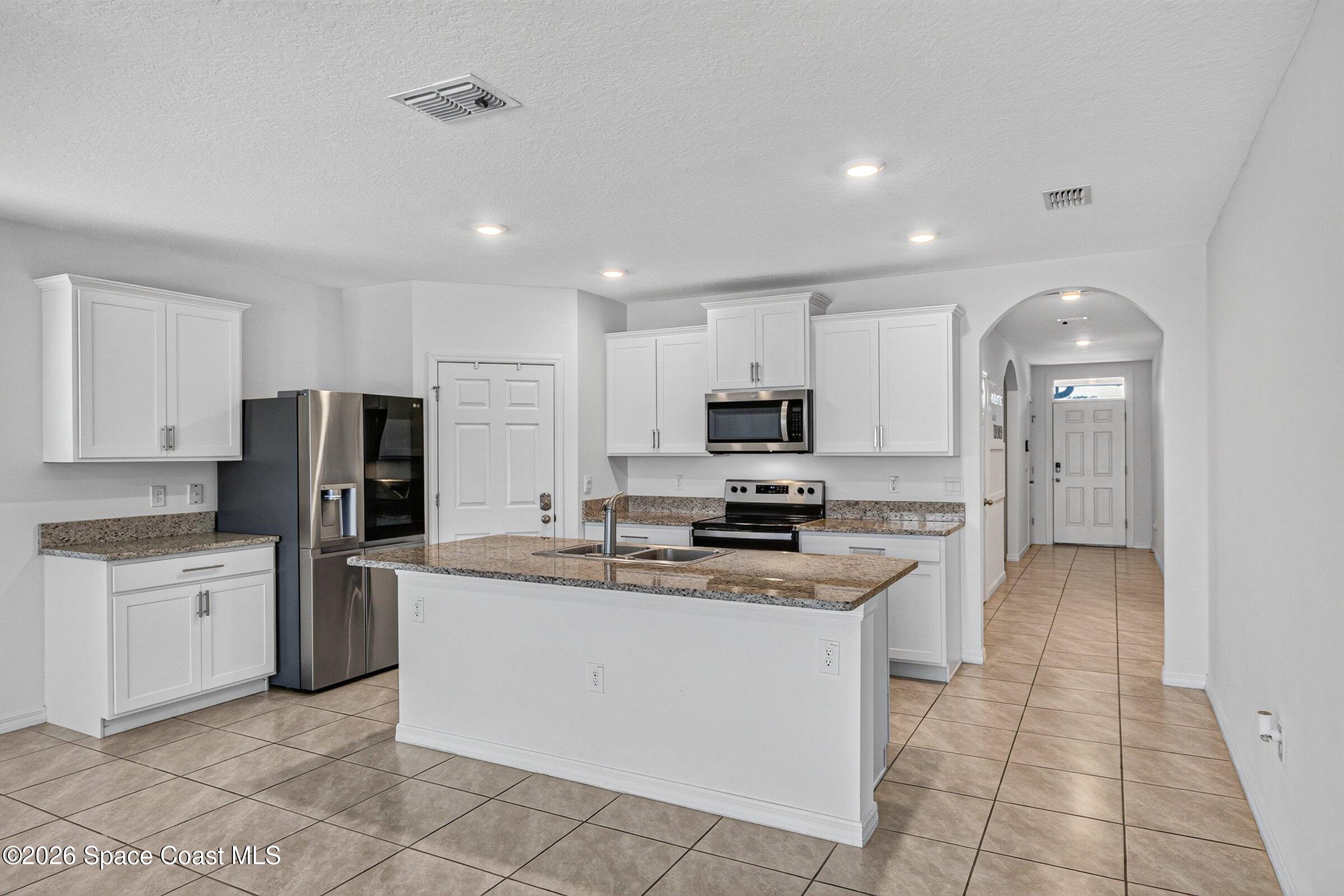 3419 Foggy Mist Road Southeast Palm Bay, FL 32909 - Photo 3 of 39 Kitchen
