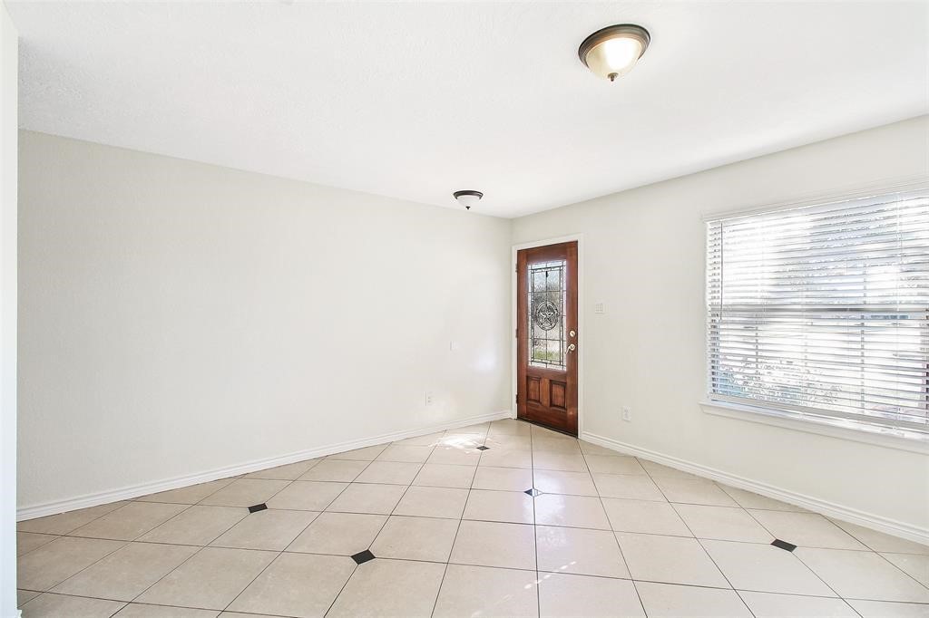 21350 Beacon Springs Lane Katy, TX 77449 - Photo 4 of 8 a view of an empty room with a window
