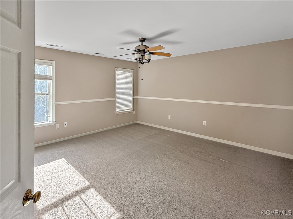 2324 Millcrest Terrace Midlothian, VA 23112 - Photo 12 of 25 an empty room with windows and fan