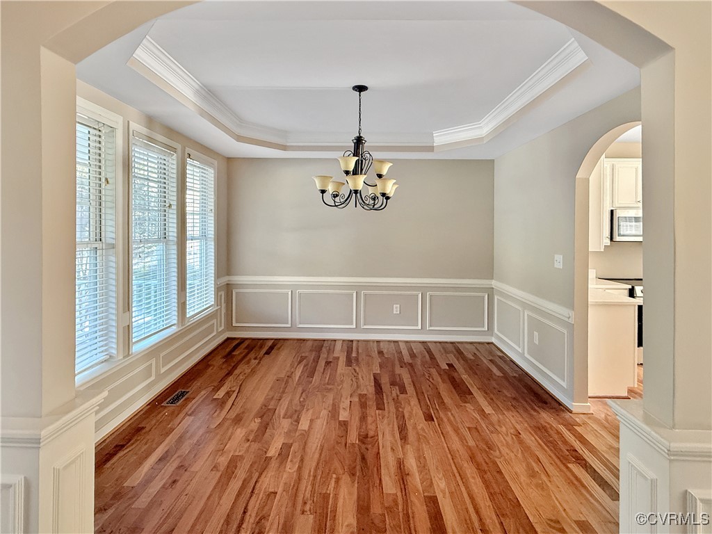 2324 Millcrest Terrace Midlothian, VA 23112 - Photo 4 of 25 a view of empty room with wooden floor and windows
