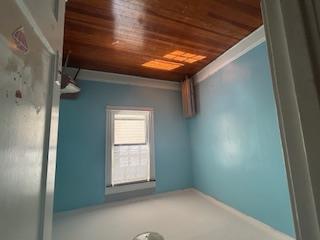 62-53 80th Road Queens, NY 11385 - Photo 9 of 11 Spare room featuring hardwood / wood-style floors and baseboards