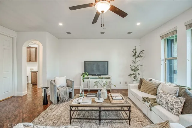 a dining hall with stainless steel appliances granite countertop sink stove and refrigerator