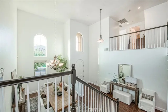 a bedroom with a bed and a table in it