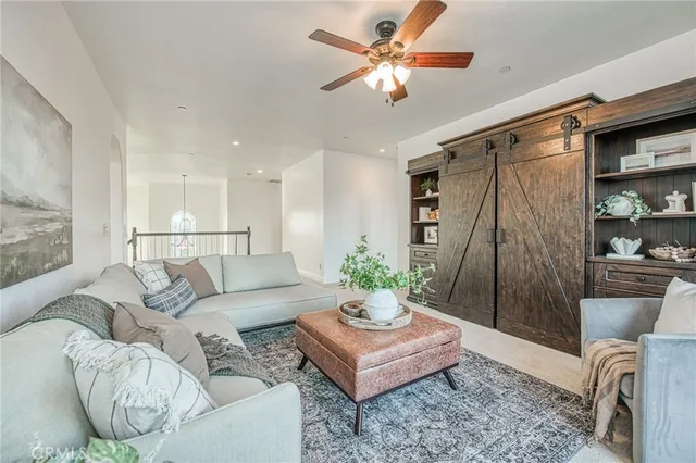 a bedroom with a bed and a lamp