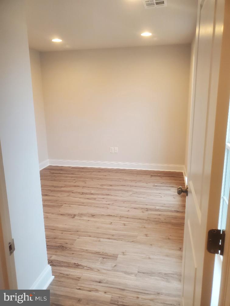 3094 Egreton Road Mechanicsburg, PA 17055 - Photo 12 of 14 a view of room with wooden floor