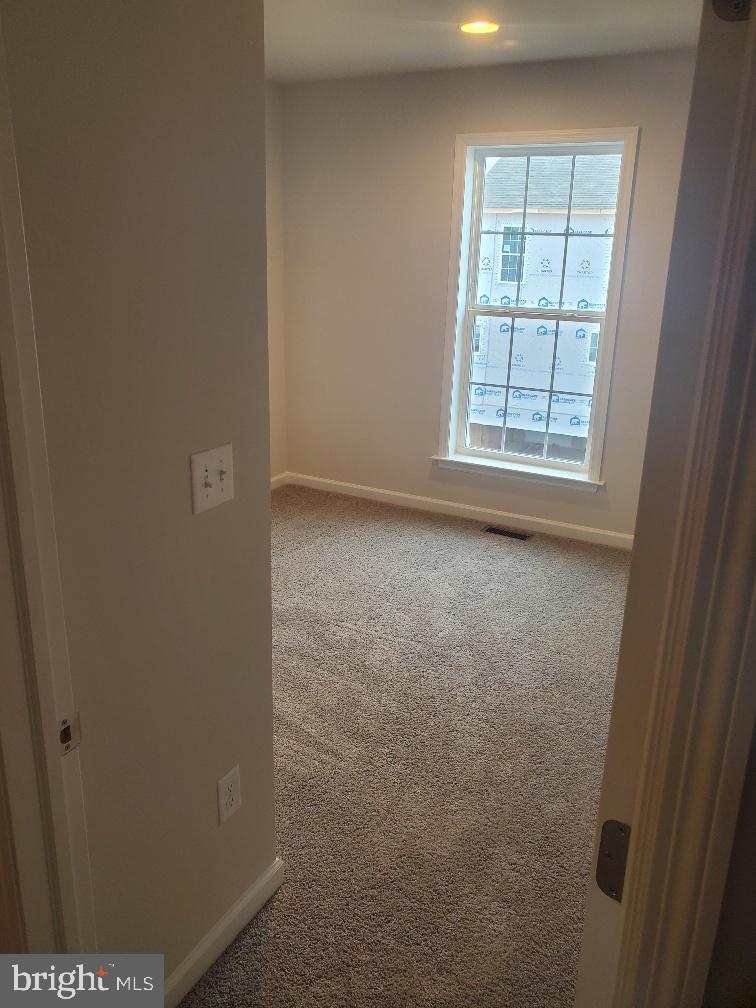 3094 Egreton Road Mechanicsburg, PA 17055 - Photo 6 of 14 an empty room with windows