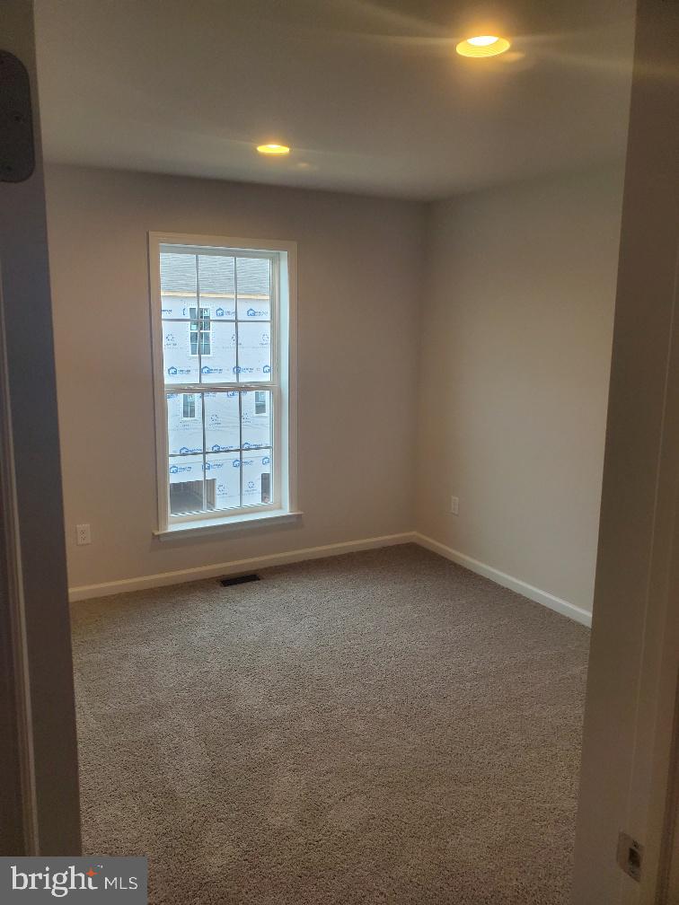 3094 Egreton Road Mechanicsburg, PA 17055 - Photo 7 of 14 an empty room with windows