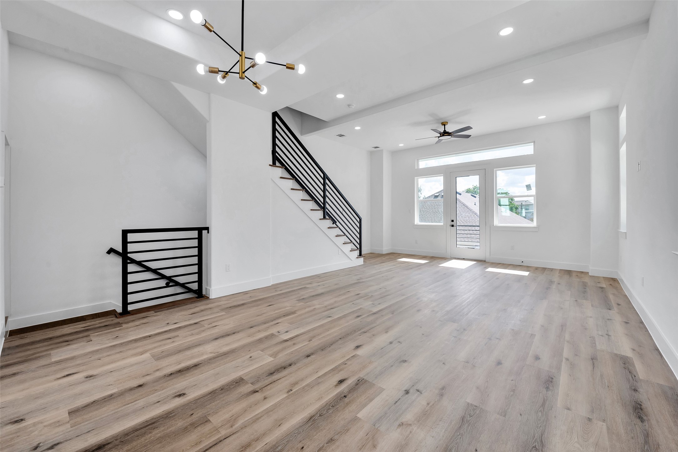1805 Emir Street, Unit H Houston, TX 77009 - Photo 43 of 43 wooden floor in an empty room with a window