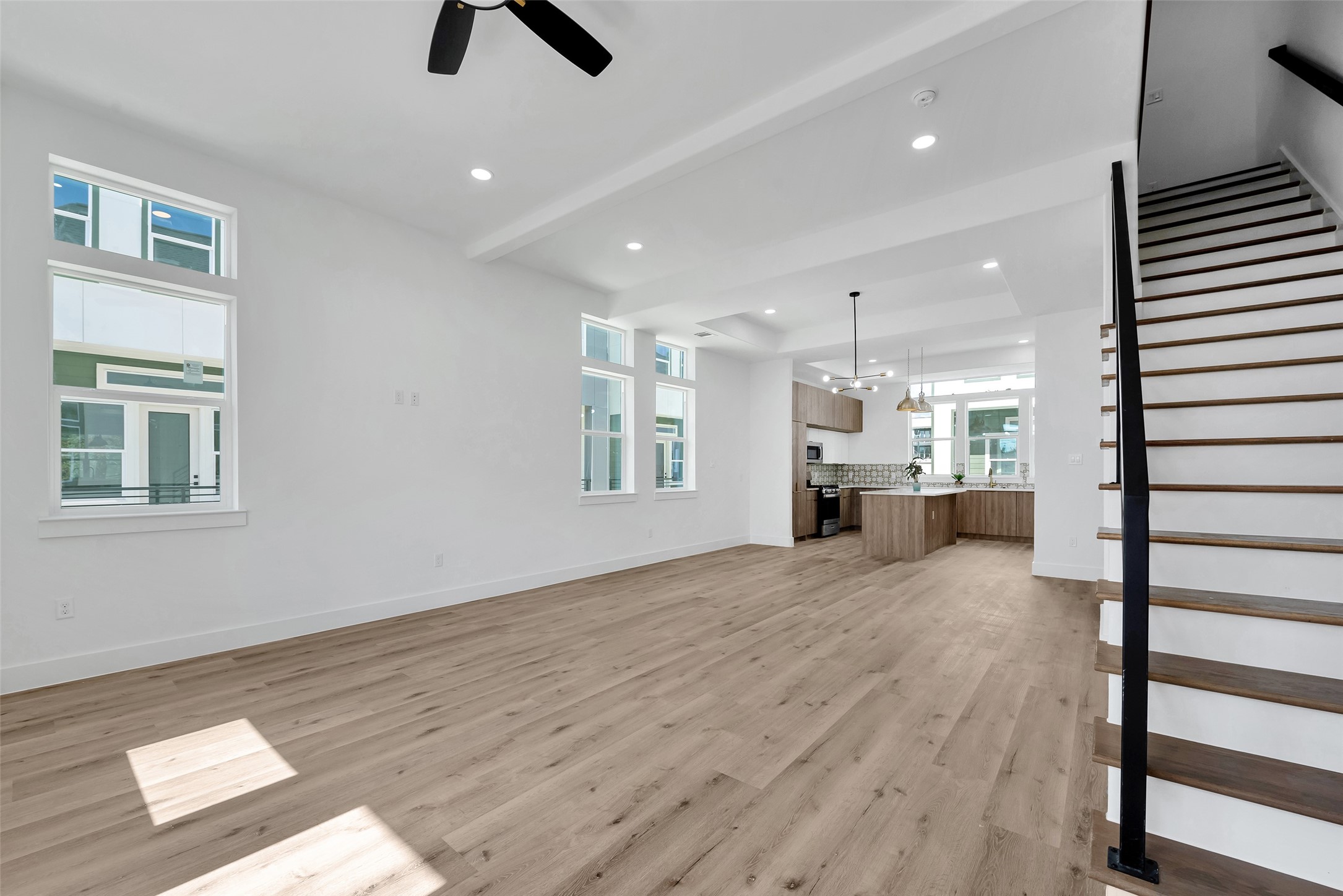 1805 Emir Street, Unit H Houston, TX 77009 - Photo 24 of 43 a view of an empty room with window and wooden floor