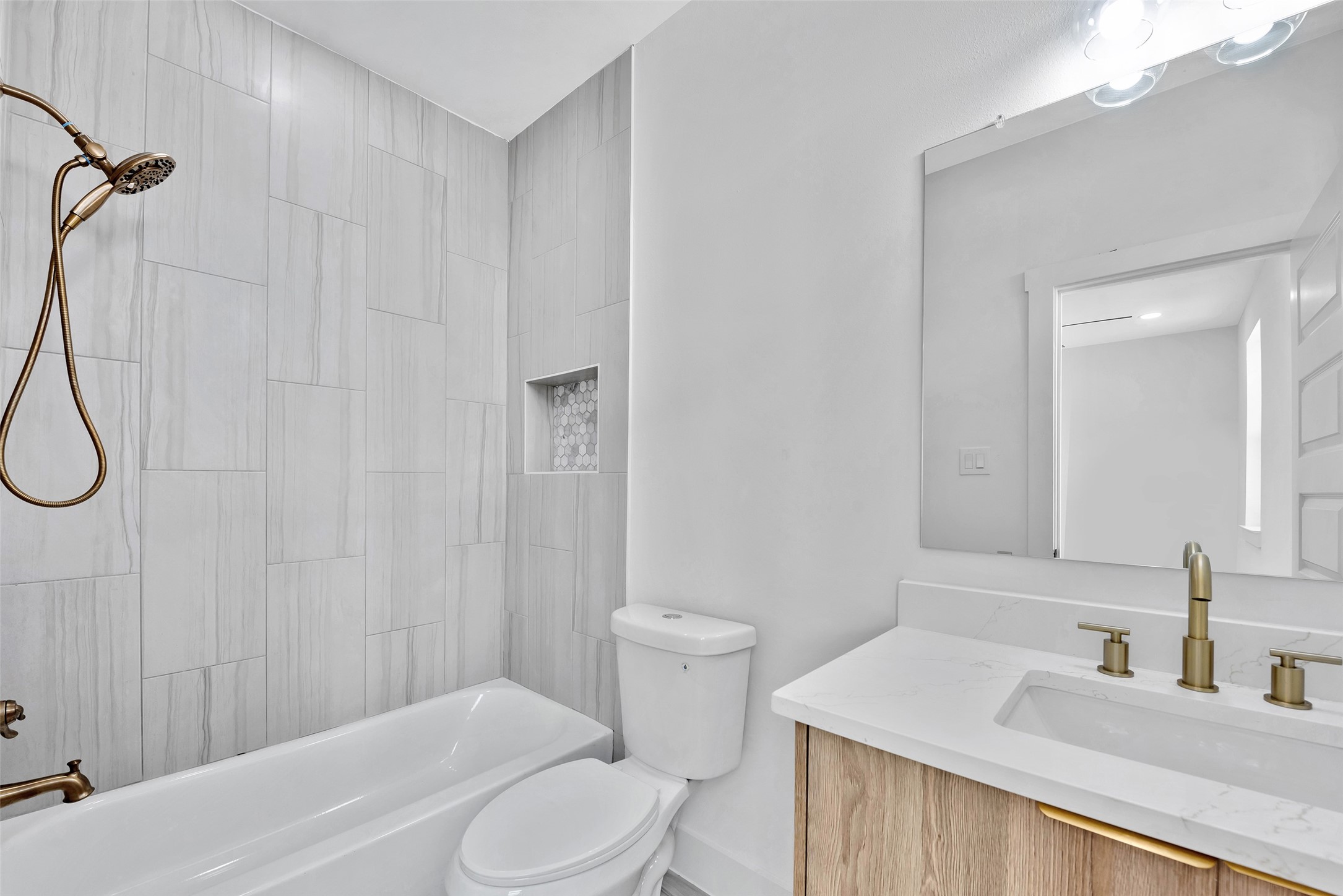 1805 Emir Street, Unit H Houston, TX 77009 - Photo 35 of 43 a bathroom with a sink a toilet and shower