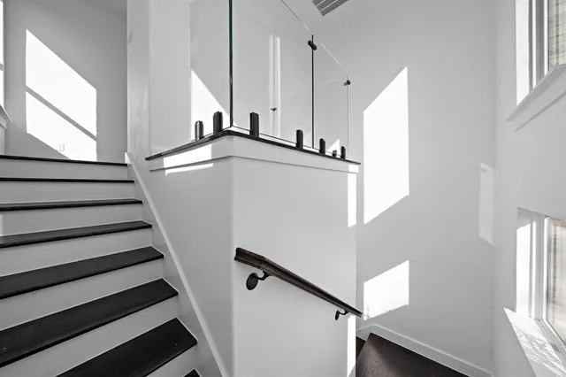 a view of a kitchen with wooden floor