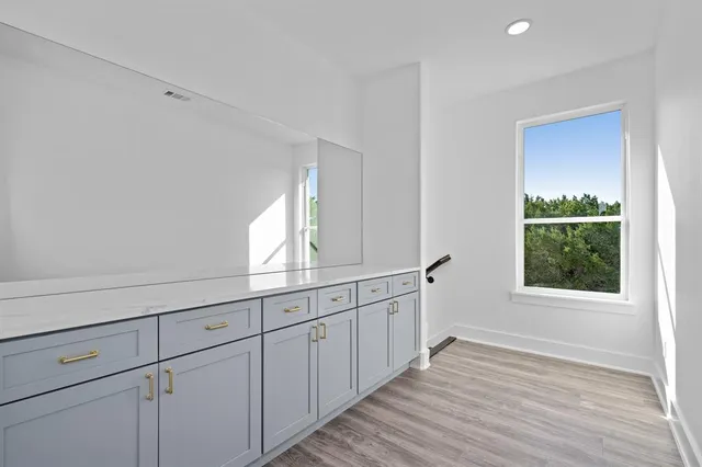 a view of an empty walk in closet