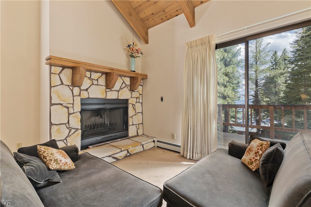607 Crystal Peak Road Incline Village, NV 89451 - Photo 15 of 34 a living room with furniture and a fireplace