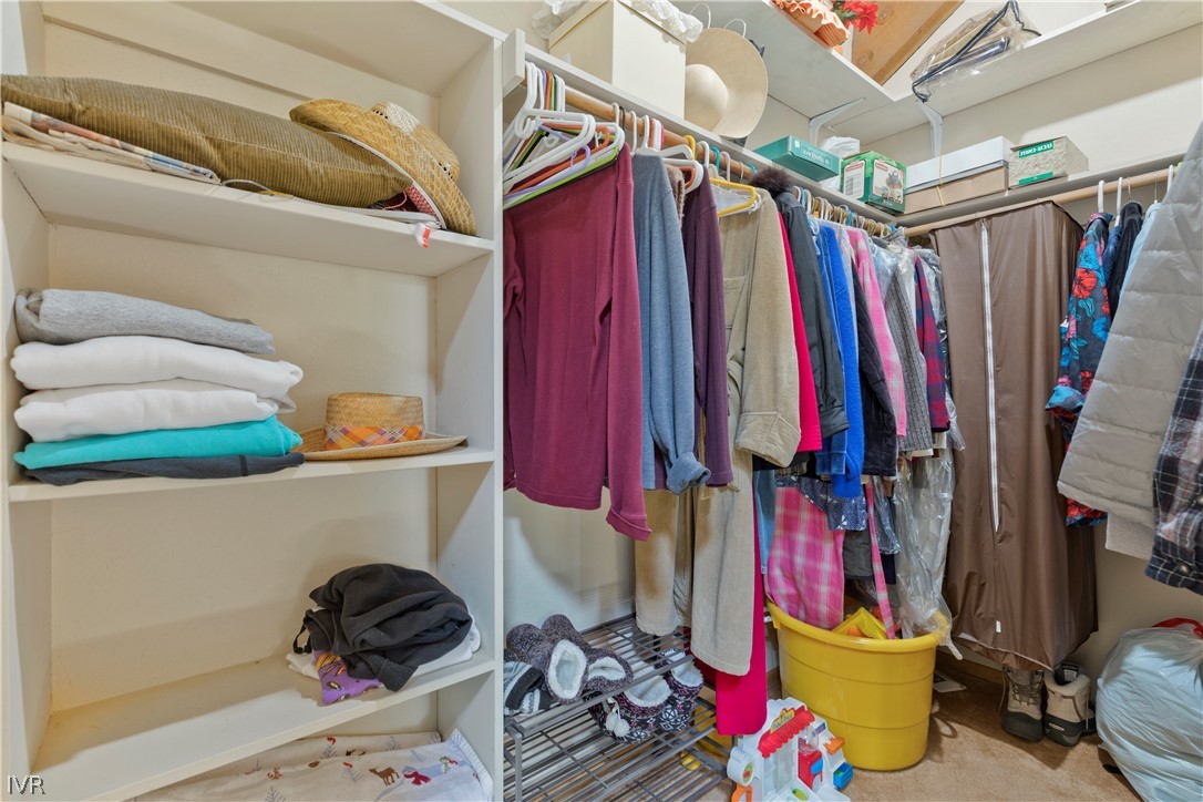 607 Crystal Peak Road Incline Village, NV 89451 - Photo 19 of 34 a view of walk in closet with clothes and shoes