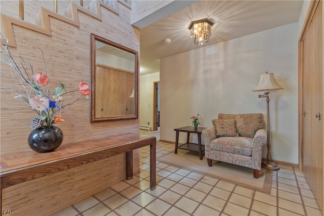 607 Crystal Peak Road Incline Village, NV 89451 - Photo 21 of 34 a living room with furniture and a potted plant