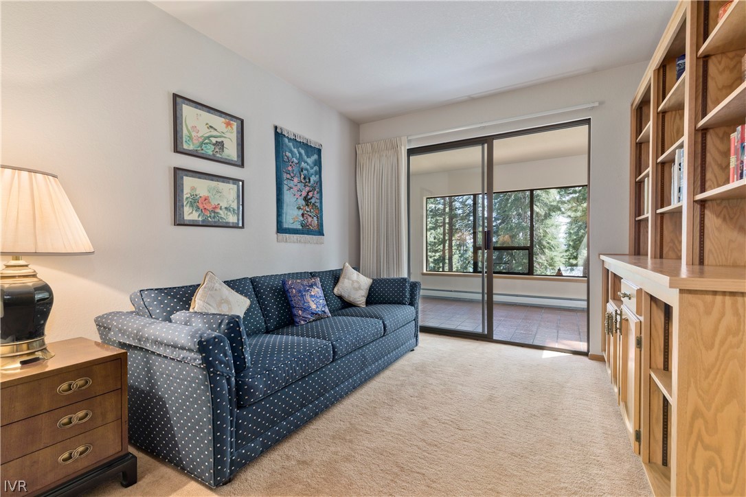 607 Crystal Peak Road Incline Village, NV 89451 - Photo 25 of 34 a living room with furniture and a flat screen tv