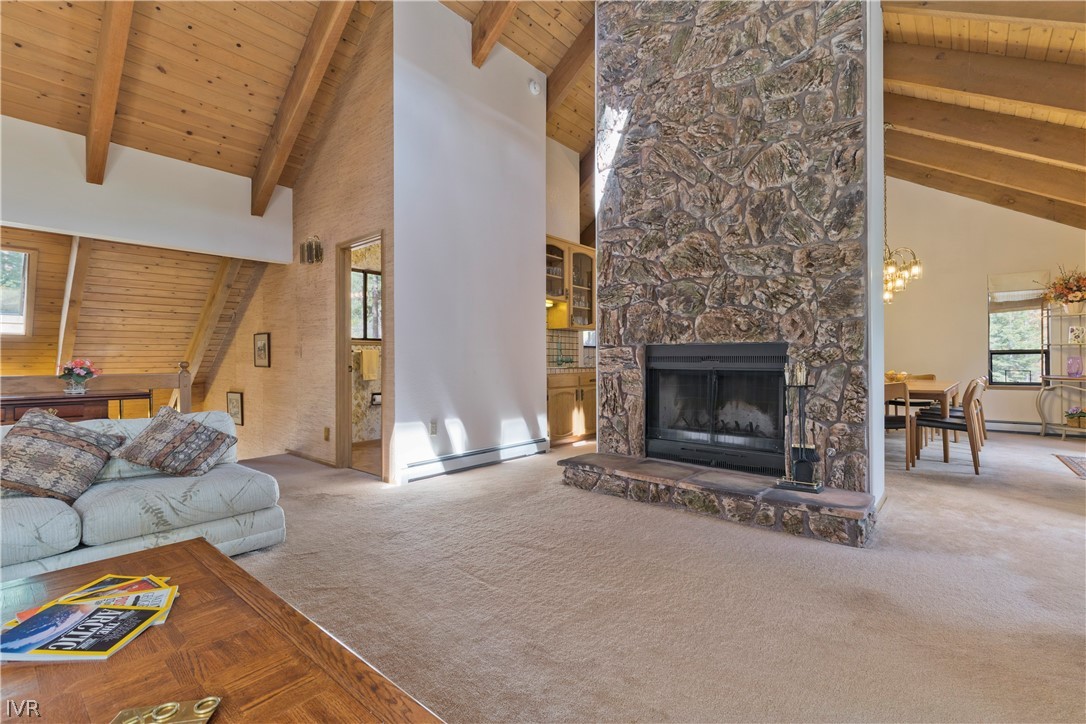 607 Crystal Peak Road Incline Village, NV 89451 - Photo 4 of 34 a living room with furniture and a fireplace