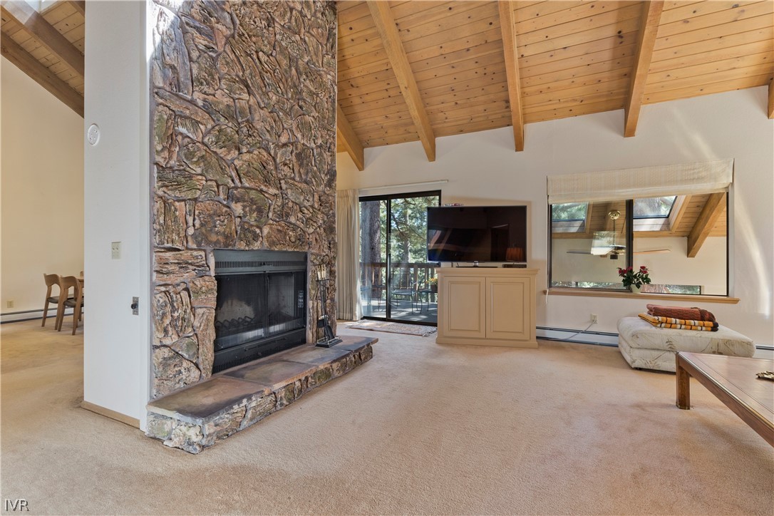 607 Crystal Peak Road Incline Village, NV 89451 - Photo 5 of 34 a living room with furniture and a fireplace