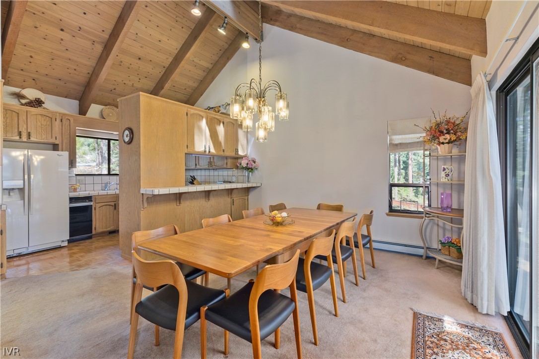 607 Crystal Peak Road Incline Village, NV 89451 - Photo 8 of 34 a view of a dining room with furniture and window