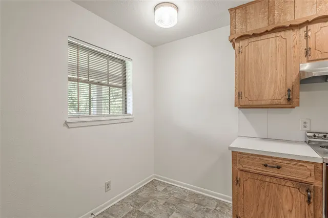 a view of a storage and utility room in empty room