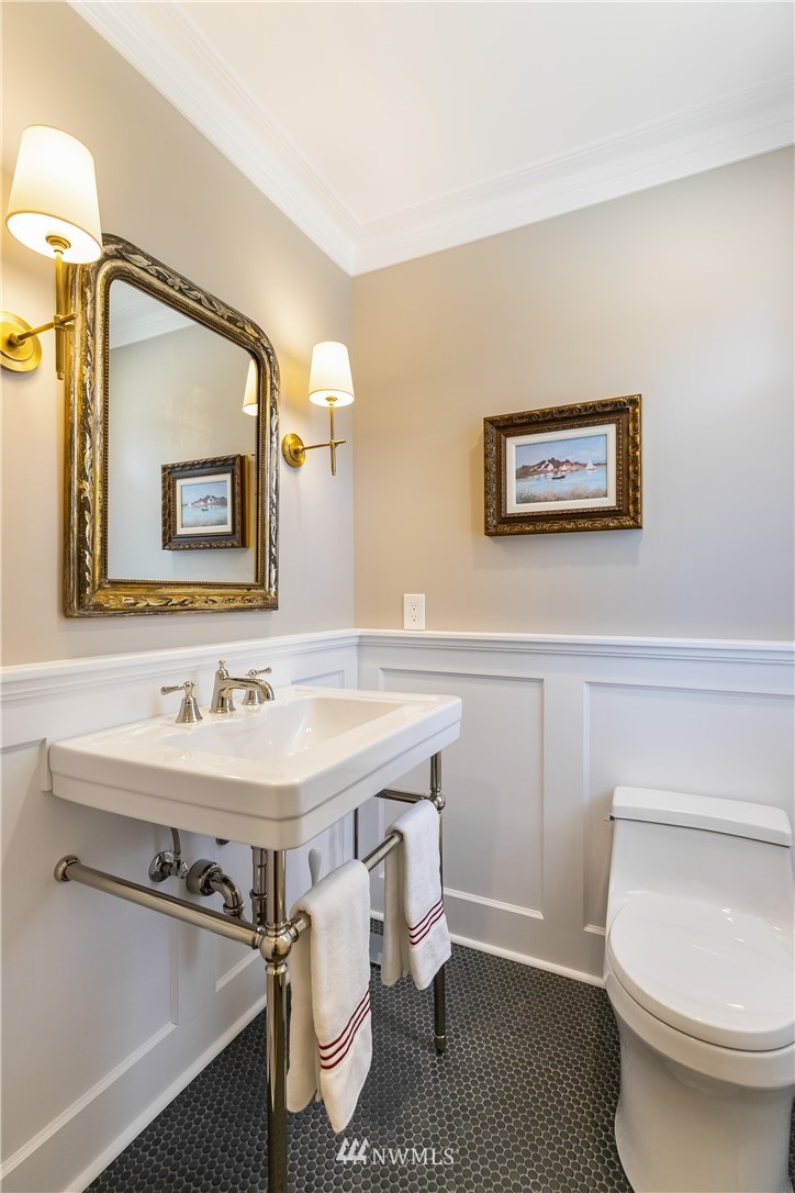 245 Middlefield Road Bellingham, WA 98225 - Photo 29 of 40 a bathroom with a sink a toilet and mirror
