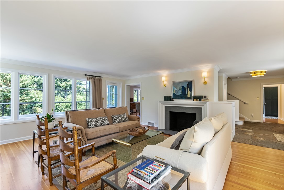 245 Middlefield Road Bellingham, WA 98225 - Photo 10 of 40 a living room with furniture and a fireplace