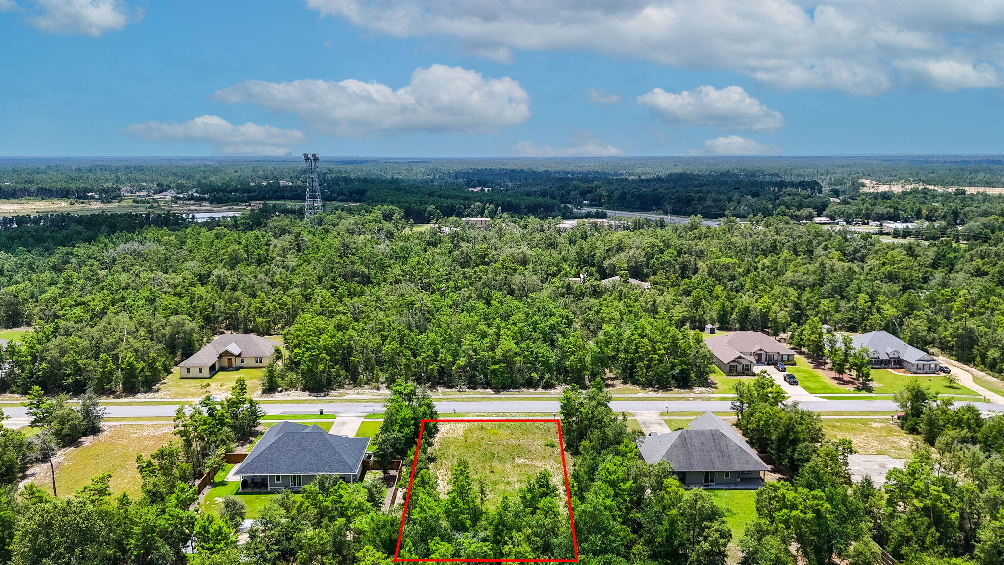 109 Lake Merial Trail Panama City, FL 32409 - Photo 11 of 12 an aerial view of house with yard swimming pool and outdoor seating