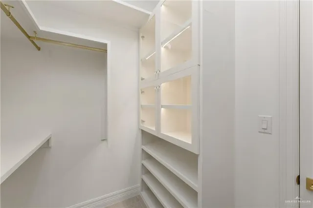 a view of an empty walk in closet