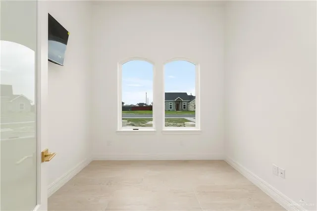 an empty room with windows